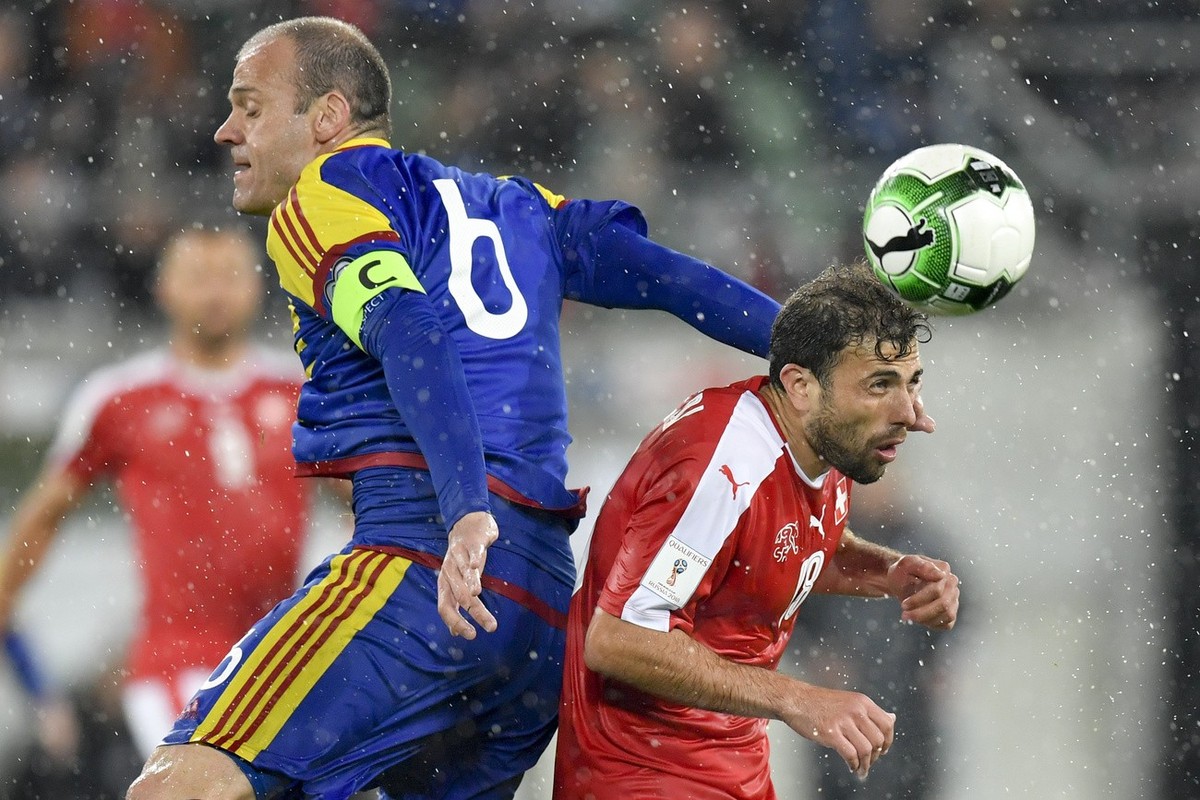 Swiss midfielder Admir Mehmedi, right, fights for the ball with Andorra's Ildefons Lima, during the 2018 Fifa World Cup Russia group B qualification soccer match between Switzerland and Andorra a ...