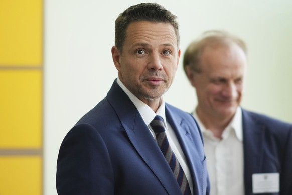 Presidential candidate Rafal Trzaskowski prepares to cast his vote during the presidential election runoff in Warsaw, Poland, Sunday, June 1, 2025. (AP Photo/Petr David Josek)
Poland Presidential Elec ...