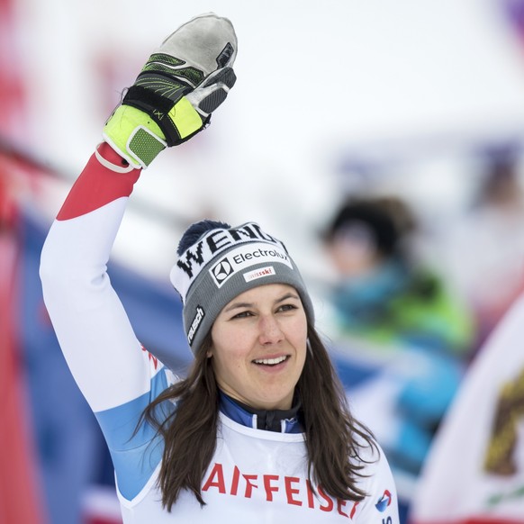 epa06481136 Third placed Wendy Holdener of Switzerland celebrates on the podium for the Women&#039;s Slalom race at the FIS Alpine Skiing World Cup in Lenzerheide, Switzerland, 28 January 2018. EPA/JE ...