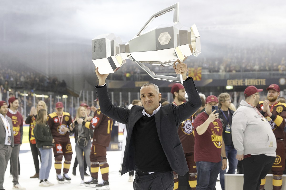 Geneve-Servette's head coach Jan Cadieux celebrates with the trophy after the Champions Hockey League Final game between Switzerland's Geneve-Servette HC and Sweden's Skelleftea AIK, at ...