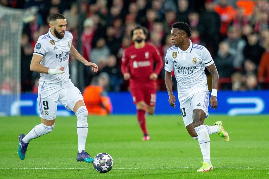 Liverpool v Real Madrid Champions League 21/02/2023. Real Madrid forward Karim Benzema 9 Real Madrid forward Vinicius Junior 20 during the Champions League match between Liverpool and Real Madrid at A ...