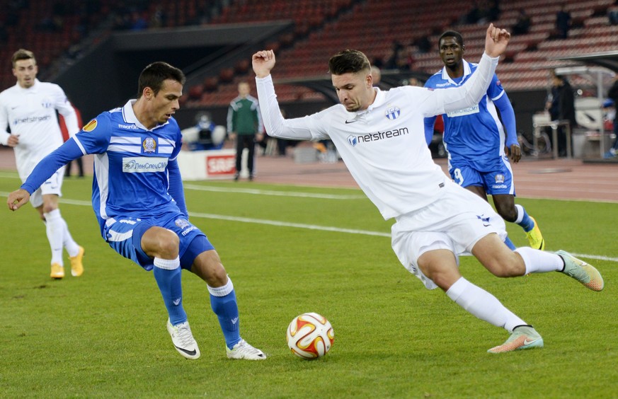 Zurich&#039;s Berat Djimsiti, right, fights for the ball against Limassol‚Äôs Hugo Lopez, left, in an UEFA Europa League group stage soccer match between Switzerland&#039;s FC Zuerich and Cyprus FC Ap ...