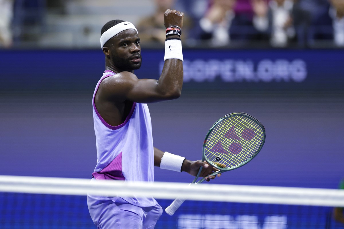 Frances Tiafoe, of the United States, celebrates after winning a point against Grigor Dimitrov, of Bulgaria, during the quarterfinals of the U.S. Open tennis championships, Tuesday, Sept. 3, 2024, in  ...