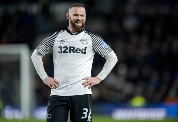 epa08273211 Derby County's Wayne Rooney reacts during the English FA cup fifth round soccer match between Derby County and Manchester United held at the Pride Park in Derby, Britain, 05 March 2020. EP ...