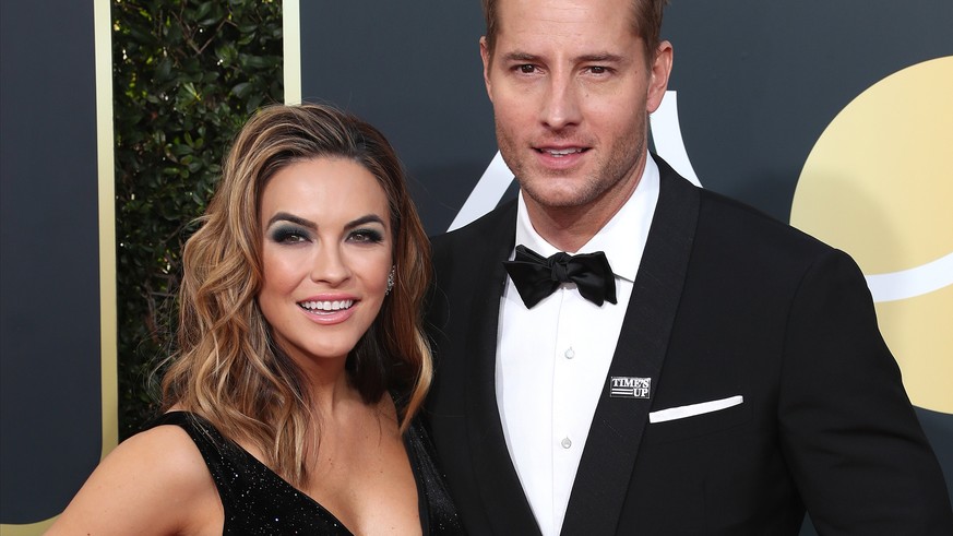 epa06423859 Chrishell Stause (L) and Justin Hartley (R) arrive for the 75th annual Golden Globe Awards ceremony at the Beverly Hilton Hotel in Beverly Hills, California, USA, 07 January 2018. *** Loca ...