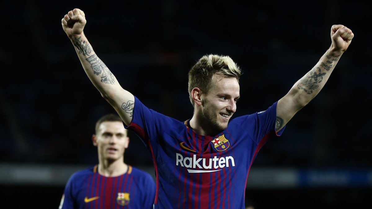 FC Barcelona's Ivan Rakitic celebrates after scoring during the Spanish Copa del Rey round of 16 second leg soccer match between FC Barcelona and Celta de Vigo at the Camp Nou stadium in Barcelon ...