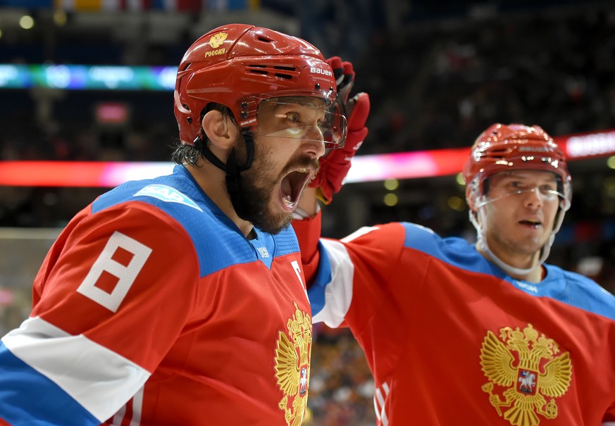 Sep 22, 2016; Toronto, Ontario, Canada; Team Russia forward Alex Ovechkin (8) celebrates with forward Evgeny Kuznetsov (92) after setting up a goal by teammate Vladimir Tarasenko (not pictured) agains ...