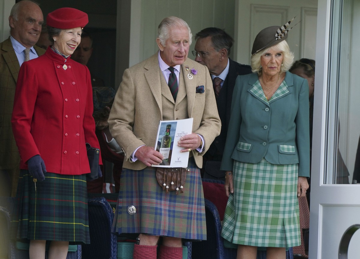From left, Britain's Princess Anne, the Princess Royal, King Charles III and Queen Camilla look on, during the Braemar Gathering highland games, in Braemar, a short distance from the royals' ...