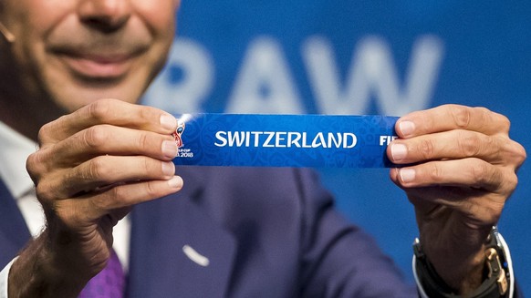 epa06271052 Spanish former soccer player Fernando Hierro shows the lot of Switzerland during the 2018 FIFA World Cup European Play-off draw at the FIFA headquarter in Zuerich, Switzerland, 17 October  ...