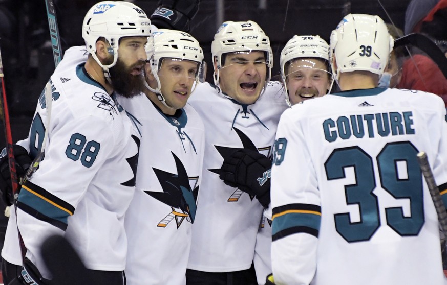 San Jose Sharks right wing Timo Meier (28) celebrates his goal with teammates during the second period of an NHL hockey game against the New Jersey Devils, Tuesday, Nov. 30, 2021, in Newark, N.J. (AP  ...