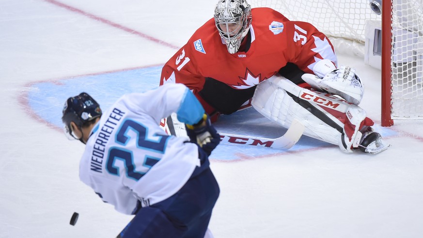 Sep 27, 2016; Toronto, Ontario, Canada; Team Canada goalie Carey Price (31) makes a save against Team Europe forward Nino Niederreiter (22) during the third period in game one of the World Cup of Hock ...