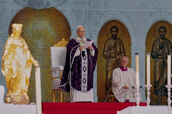 Pope Leo XIV delivers his homily during a mass at Stade Louis II in Fontvieille, Monaco, Saturday, March 28, 2026. (AP Photo/Laurent Cipriani)
Leo XIV