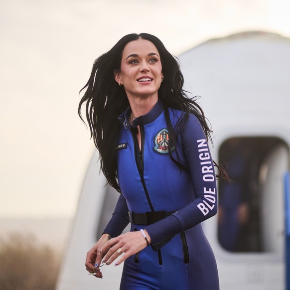 epa12032410 A handout photo made available by Blue Origin shows US singer Katy Perry after being aboard Blue Origin?s New Shepard NS-31 rocket on a short mission into orbit after taking off from Launc ...
