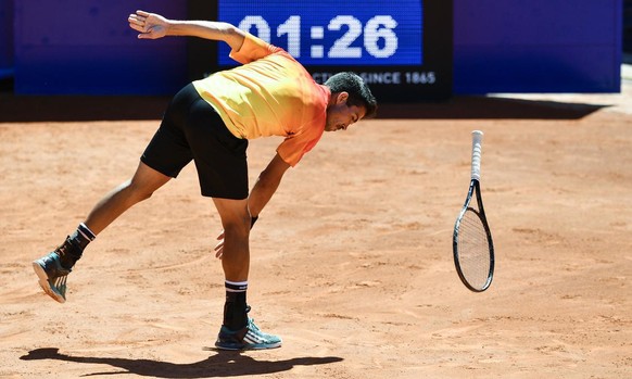 Yann Marti of Switzerland throws his racket as he reacts during a first round game at the Suisse Open tennis tournament in Gstaad, Switzerland, Monday, July 17, 2016. (KEYSTONE/Peter Schneider)