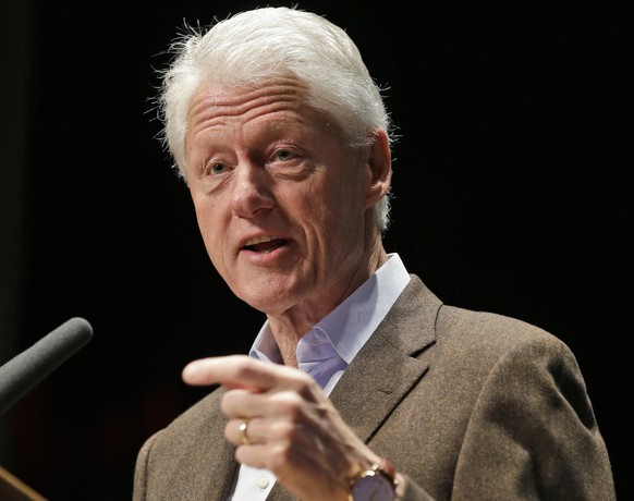 FILE - In this Oct. 30, 2013 file photo, former President Bill Clinton speaks in Charlottesville, Va. Clinton, popular in territory unfriendly to President Barack Obama, is reprising his role as a sup ...