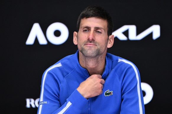 epa11105154 Novak Djokovic of Serbia speaks to the media during his post match press coneference following his Men?s semifinal loss to Jannik Sinner of Italy on Day 13 of the 2024 Australian Open at M ...
