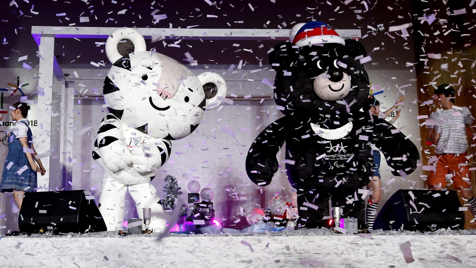 epa05430020 The 2018 Pyeongchang Winter Olympics Mascots Soohorang (2-L) and Bandabi (2-R) pose during a launch ceremony for the mascots in Pyeongchang-gun, South Korea, 18 July 2018. The first Winter ...