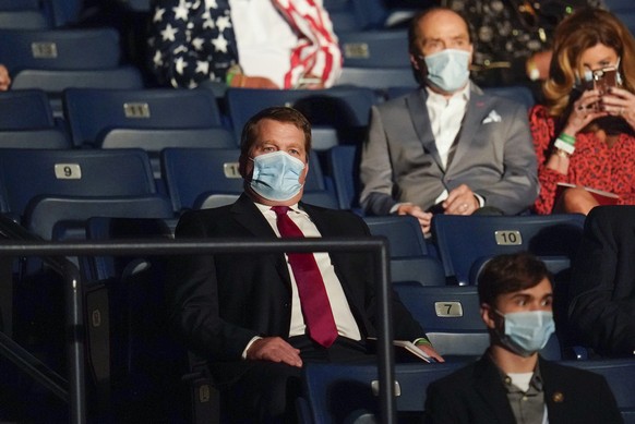 Tony Bobulinski, center seated, who says he is a former associate of Hunter Biden, waits for the start of the second and final presidential debate Thursday, Oct. 22, 2020, at Belmont University in Nas ...