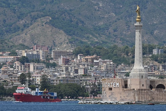 epa10027601 The Sea Eye 4 rescue ship with 476 people on board enters the port of Messina, Italy, 22 June 2022. Another ship, the Sea Watch 4 carrying over 300 people, was still waiting for permission ...