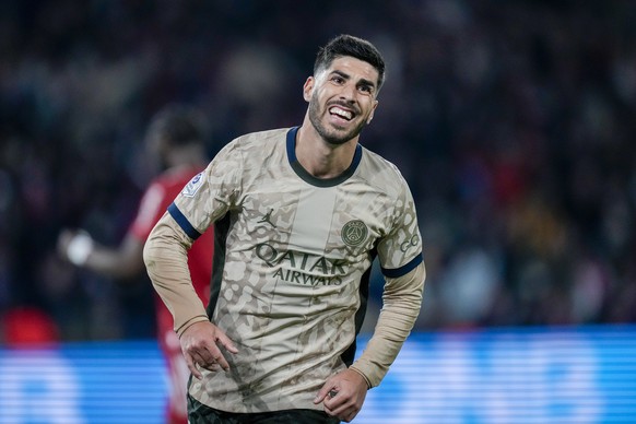 PSG&#039;s Marco Asensio celebrates scoring his side&#039;s opening goal during the French League One soccer match between Paris Saint-Germain and Brest at the Parc des Princes stadium in Paris, Franc ...