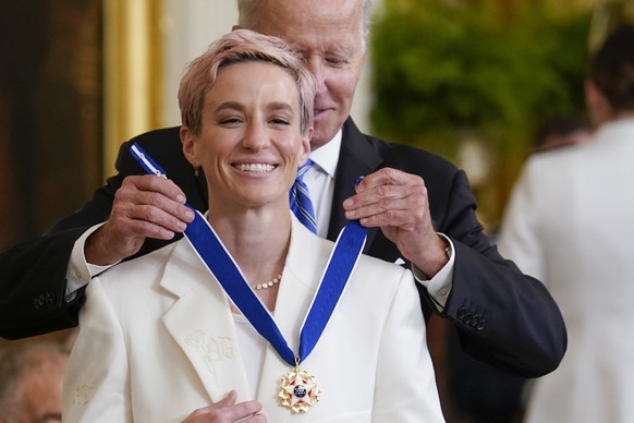 FILE - President Joe Biden awards the nation's highest civilian honor, the Presidential Medal of Freedom, to Megan Rapinoe at the White House in Washington, Thursday, July 7, 2022. (AP Photo/J.S...