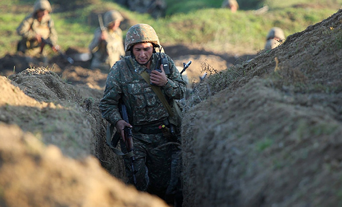 Armenian soldiers take their position on the front line in Tavush region, Armenia, Tuesday, July 14, 2020. Skirmishes on the volatile Armenia-Azerbaijan border escalated Tuesday, marking the most seri ...