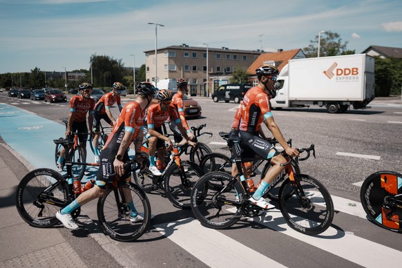 Team Bahrain Victorious riders return after a training near Copenhagen, Denmark, Thursday, June 30, 2022. Riders and staff from the Bahrain Victorious team had their homes searched by police before th ...