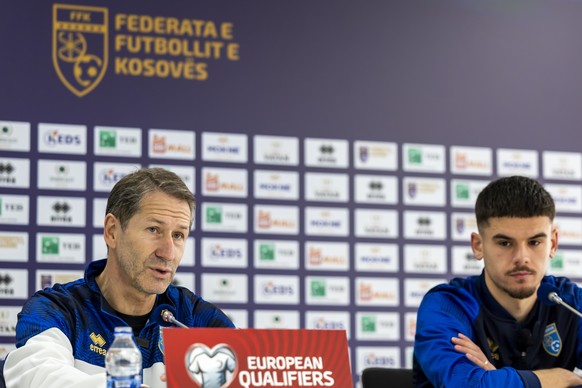 epa12531273 Kosovo&#039;s national soccer head coach Franco Foda (L) and player Albian Hajdari attend a press conference of the team at Fadil Vokrri stadium in Pristina, Kosovo, 17 November 2025. Koso ...