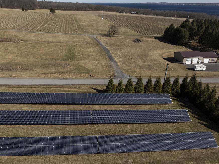 Solar panels operate at Fox Run Vineyards and Seneca Lake, Friday, March 21, 2025, in Penn Yan, N.Y. (Natasha Kaiser via AP)
Climate New York Wine Producers