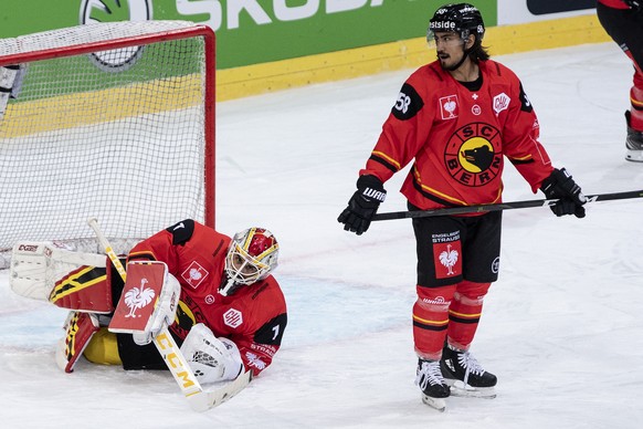 BernÕs goaltender Niklas Schlegel, left, and BernÕs Eric Blum, right, react during the Champions Hockey League first elimination round game between Switzerland&#039;s SC Bern and SwedenÕs Lulea HF, at ...