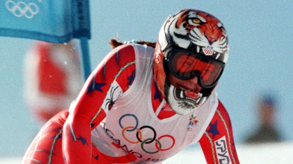 Picabo Street of Sun Valley, Idaho, passes a gate on her way to winning the gold medal in the Women's Super-G at the XVIII Olympic Winter Games in Hakuba Wednesday Feb. 11, 1998. (AP Photo/Diethe ...