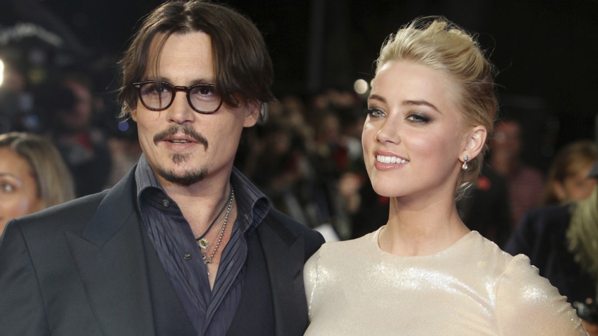 ARCHIV - US-Schauspieler Johnny Depp und Amber Heard kommen zur Europapremiere des Films