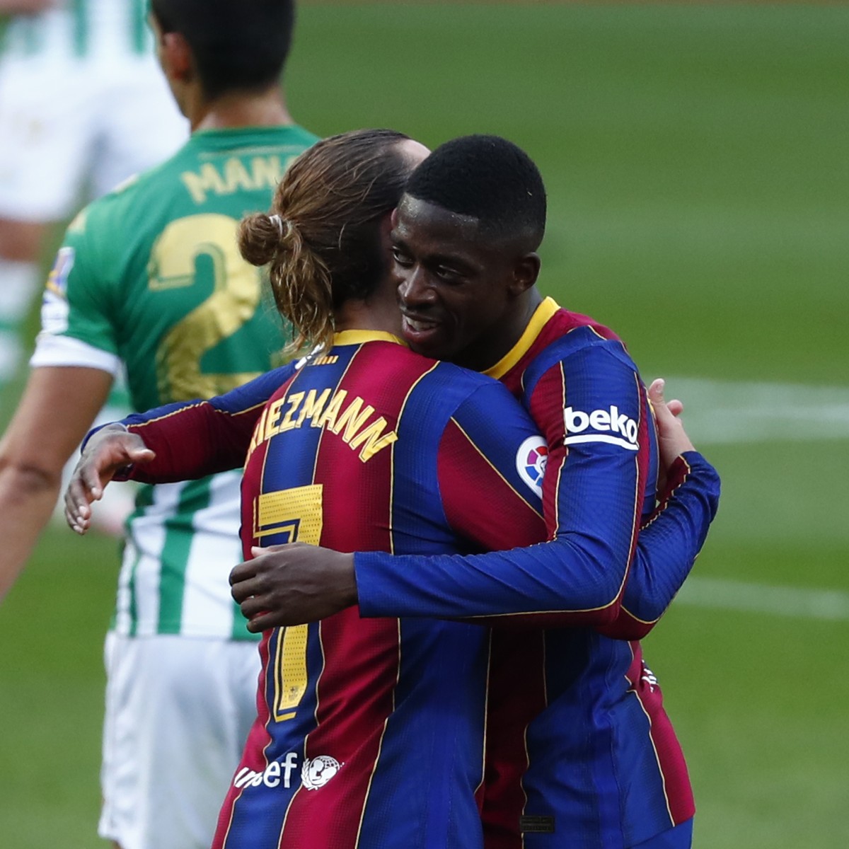 Barcelona's Ousmane Dembele, right, celebrates with Barcelona's Antoine Griezmann after scoring his side's opening goal during the Spanish La Liga soccer match between FC Barcelona and  ...