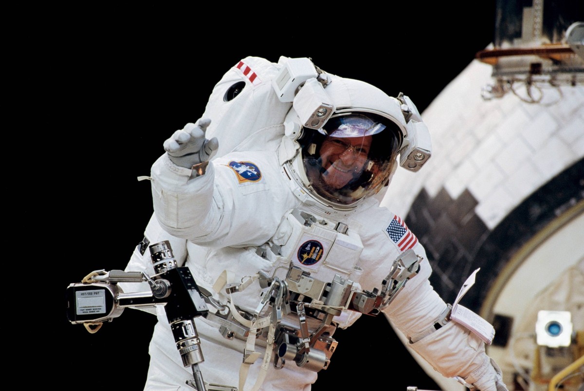September 8, 2016 - Earth Orbit, Earth Orbit - Astronaut Claude Nicollier of Space Shuttle Discovery STS-103 mission during a space walk to repair the Hubble Space Telescope February 11, 2000 in Earth ...