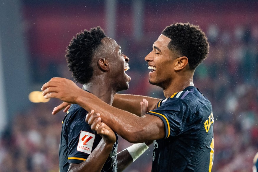 August 19, 2023, Almeria, Spain: Vinicius Junior L and Jude Bellingham R seen celebrating a goal during the LaLiga EA Sports 2023/2024 match between UD Almeria and Real Madrid at Power Horse Stadium.. ...