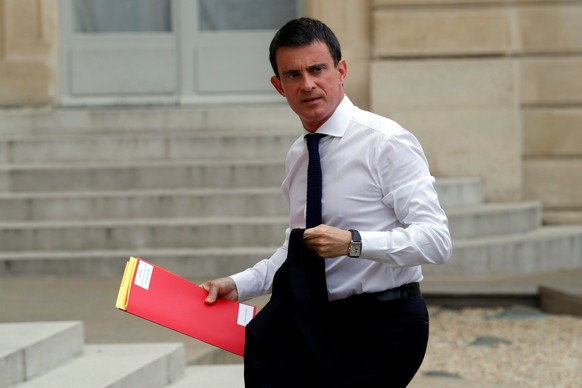 French Prime Minister Manuel Valls arrives at the Elysee Palace in Paris, France, July 16, 2016, to attend a defence meeting two day after the Bastille Day truck attack in Nice. REUTERS/Philippe Wojaz ...