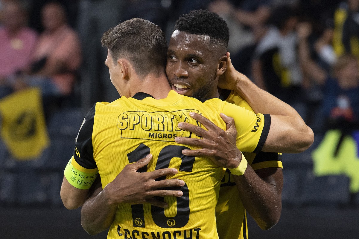Young Boys' Jordan Siebatcheu, right, and Christian Fassnacht celebrate their score to 1-1 uring the UEFA Champions League 2nd leg third qualifying round soccer match between BSC Young Boys and C ...