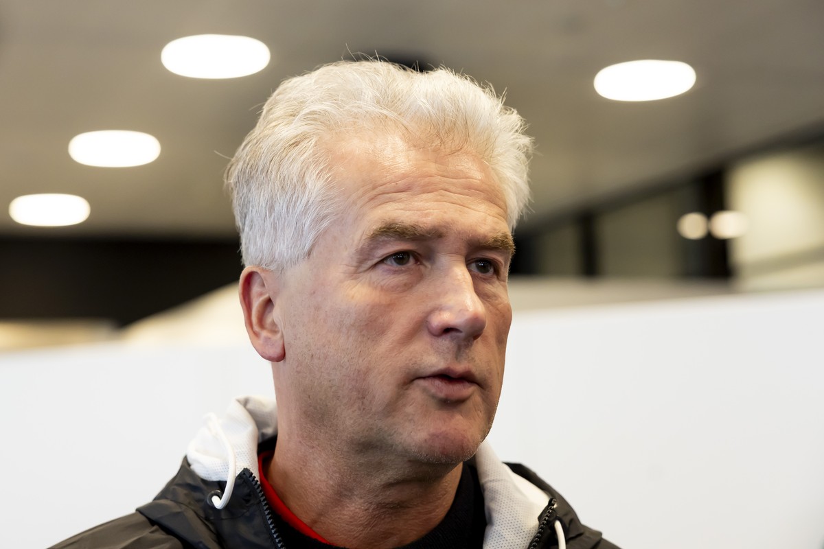 Roger Bader, head coach of Austria national ice hockey team, speaks with to media in the mixed zone one day before the IIHF 2025 World Championship quarter final game against Switzerland, at the Jyske ...