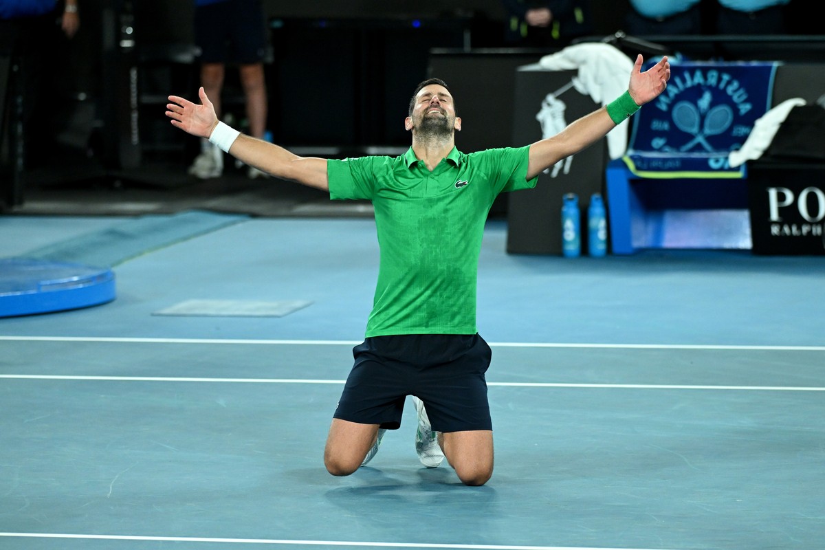 epa12692819 Novak Djokovic of Serbia celebrates his win in the men's semifinal against Jannik Sinner of Italy on day 13 of the 2026 Australian Open tennis tournament at Melbourne Park in Melbourn ...
