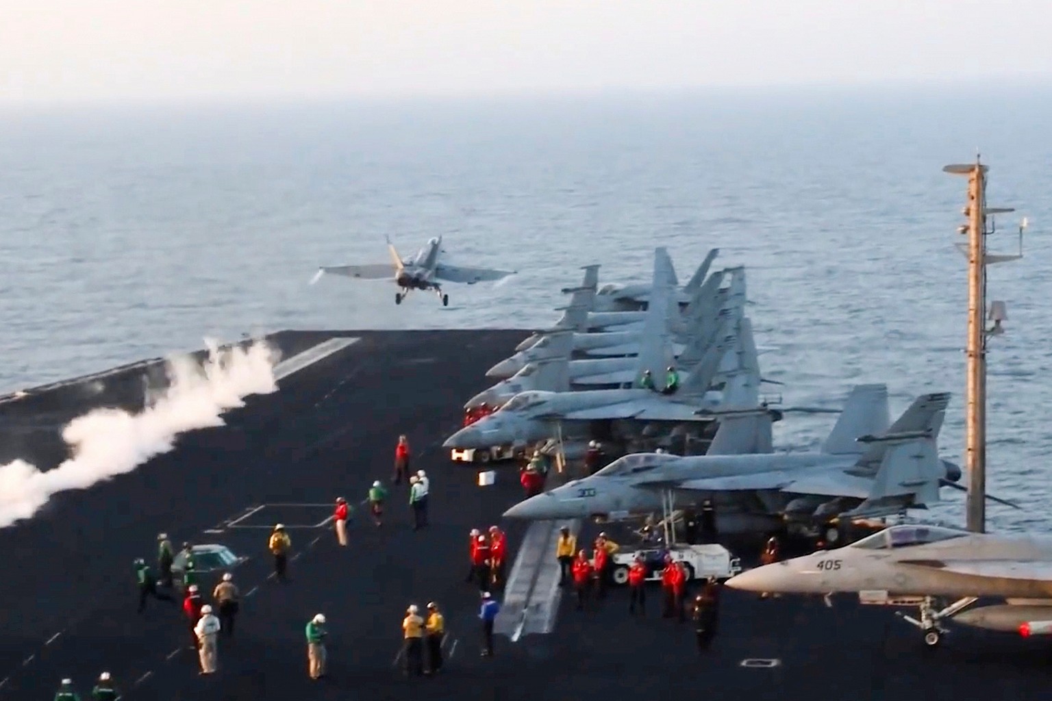 FILE - This image taken from video provided by the U.S. Navy shows an aircraft launching from the USS Harry S. Truman in the Red Sea before airstrikes in Sanaa, Yemen, March 15, 2025. (U.S. Navy via A ...
