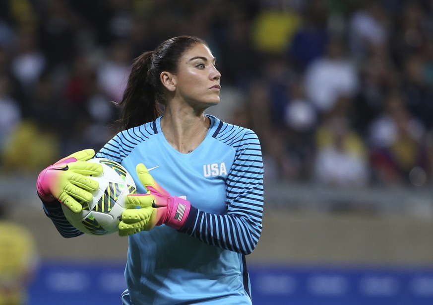 FILE - United States&#039; goalkeeper Hope Solo takes the ball during a women&#039;s soccer game at the Rio Olympics against New Zealand in Belo Horizonte, Brazil, Aug. 3, 2016. Former U.S. women