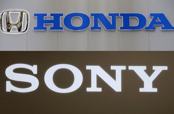 In this combination image, logos are seen for Honda Motor Co., Feb. 14, 2013, in Pittsburgh and Sony Corp., Nov. 14, 2018, in Tokyo. Sony Corp. and Honda Motor Co. agreed to set up a joint venture thi ...