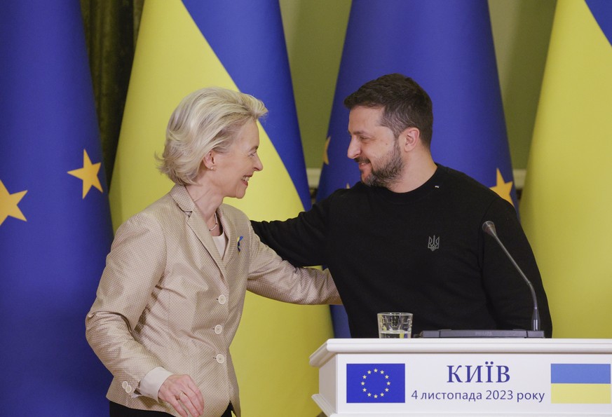 epa10957225 Ukraine&#039;s President Volodymyr Zelensky (R) and President of the European Commission Ursula von der Leyen (L) react as they address a joint press conference following their meeting in  ...
