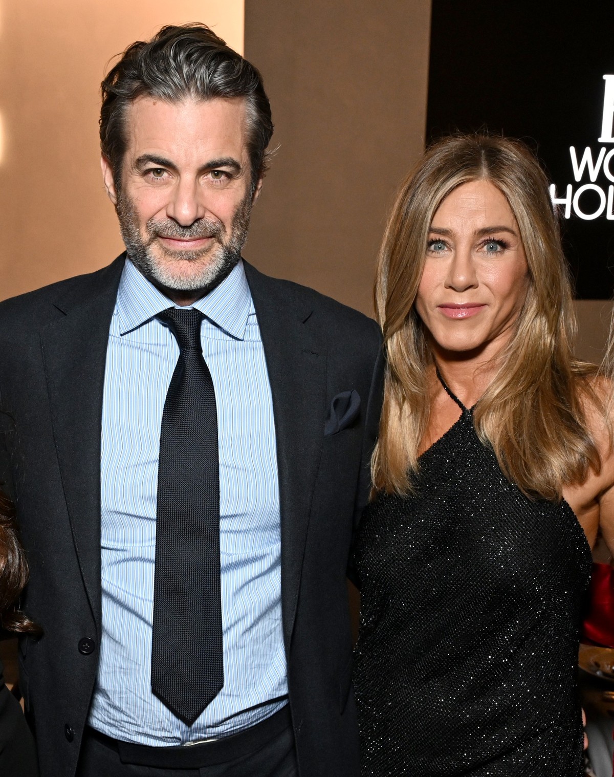 LOS ANGELES, CALIFORNIA - NOVEMBER 17: (L-R) Jim Curtis and Jennifer Aniston, wearing Ralph Lauren, attend ELLE's 2025 Women in Hollywood Celebration presented by Ralph Lauren and Bvlgari with su ...