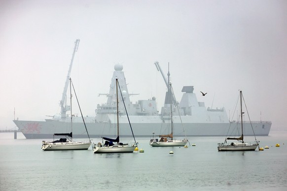 epaselect epa12807099 HMS Dragon, a Royal Navy Type 45 Daring-class air-defence destroyer warship, is moored at the HMNB Portsmouth Upper Harbour Ammunition Facility (UHFC), in Portsmouth Harbour, Bri ...