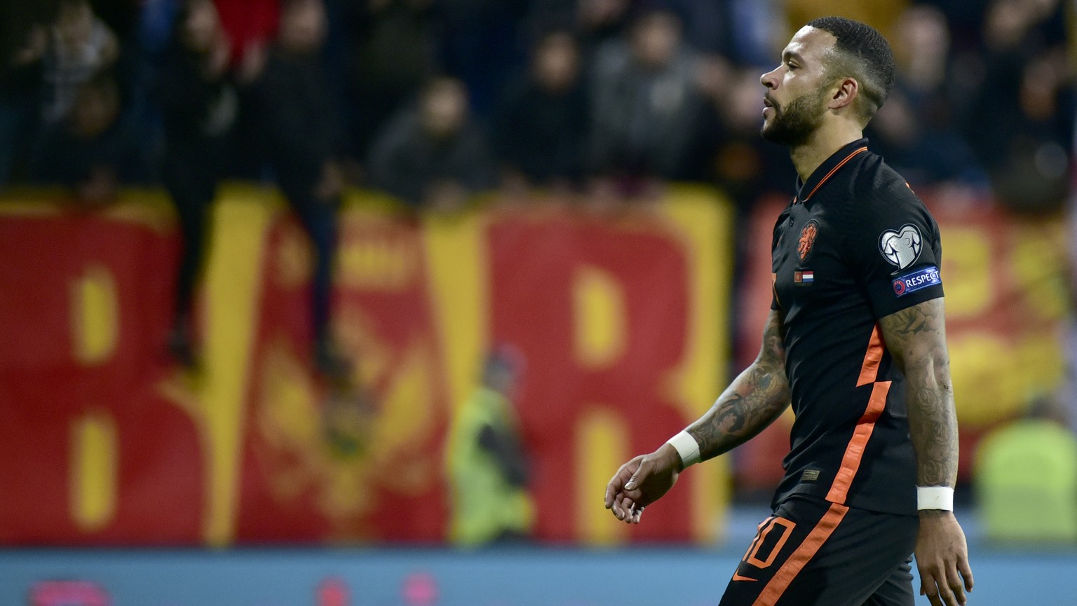 Netherlands&#039; Memphis Depay reacts after Montenegro&#039;s Nikola Vujnovic scoring his side&#039;s second goal during the World Cup 2022 group G qualifying soccer match between Montenegro and Neth ...