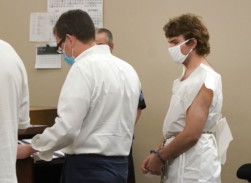 Payton Gendron talks with his attorney during his arraignment in Buffalo City Court, Saturday, May 14, 2022, in Buffalo, N.Y. Gendron was arraigned on first-degree murder charges and ordered detained  ...