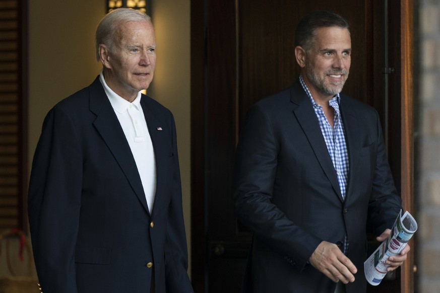 FILE - President Joe Biden and his son Hunter Biden leave Holy Spirit Catholic Church in Johns Island, S.C., after attending a Mass on Aug. 13, 2022. Biden is in Kiawah Island with his family on vacat ...