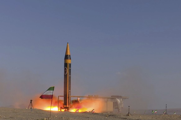 In this picture released by the Iranian Defense Ministry on Thursday, May 25, 2023, Khorramshahr-4 missile is launched at an undisclosed location, Iran. Iran unveiled on Thursday what it dubbed the la ...