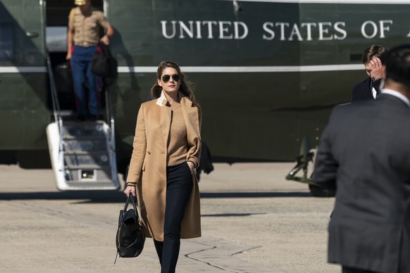 Counselor to the President Hope Hicks walks from Marine One to accompany President Donald Trump aboard Air Force One as he departs Wednesday, Sept. 30, 2020, at Andrews Air Force Base, Md. Hope, Presi ...